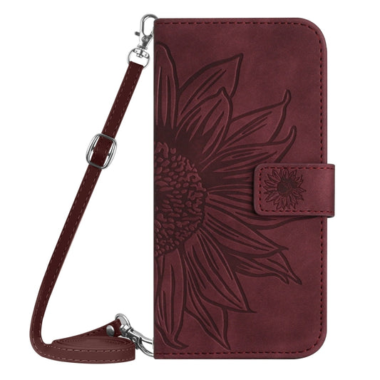 For iPhone 16 Plus Skin Feel Sun Flower Embossed Flip Leather Phone Case with Lanyard(Wine Red) by buy2fix