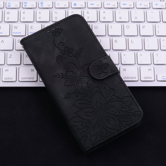 For iPhone 16e Lily Embossed Leather Phone Case(Black) by buy2fix