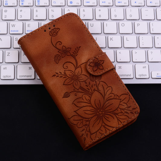 For iPhone 16 Plus Lily Embossed Leather Phone Case(Brown) by buy2fix