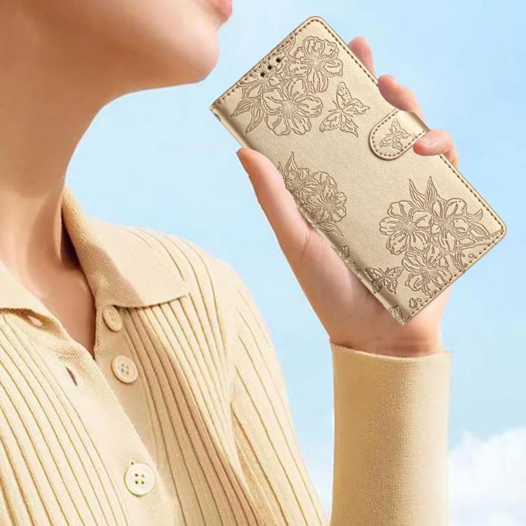 For iPhone 16e Cherry Blossom Butterfly Skin Feel Embossed PU Phone Case(Gold) - iPhone 16e Cases by buy2fix | Online Shopping UK | buy2fix