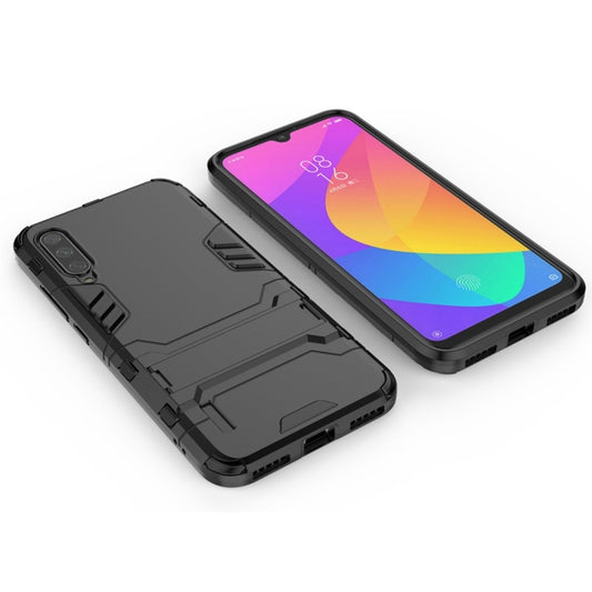 For Xiaomi Mi CC9e Shockproof PC + TPU Protective Case with Invisible Holder(Black) by buy2fix