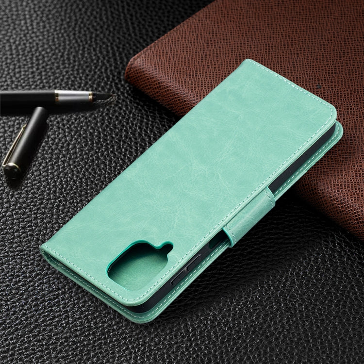 For Samsung Galaxy A12 Two Butterflies Embossing Pattern Horizontal Flip Leather Case with Holder & Card Slot & Wallet & Lanyard(Green) by buy2fix