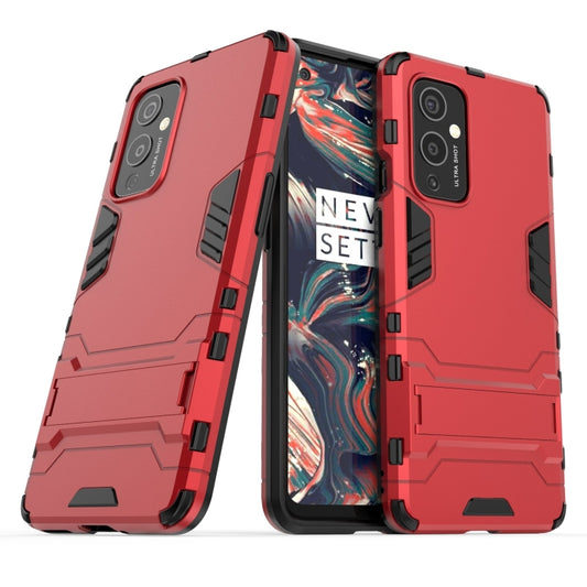 For OnePlus 9 PC + TPU Shockproof Protective Case with Holder(Red) by buy2fix