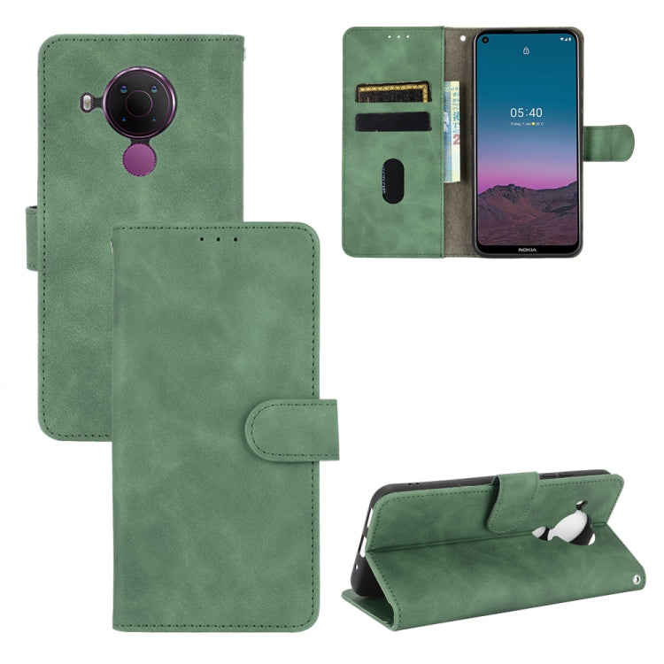 For Nokia 5.4 Solid Color Skin Feel Magnetic Buckle Horizontal Flip Calf Texture PU Leather Case with Holder & Card Slots & Wallet(Green) - Nokia Cases by buy2fix | Online Shopping UK | buy2fix