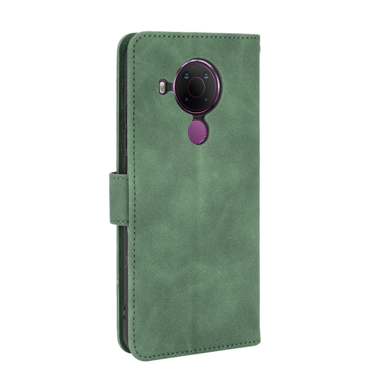 For Nokia 5.4 Solid Color Skin Feel Magnetic Buckle Horizontal Flip Calf Texture PU Leather Case with Holder & Card Slots & Wallet(Green) - Nokia Cases by buy2fix | Online Shopping UK | buy2fix