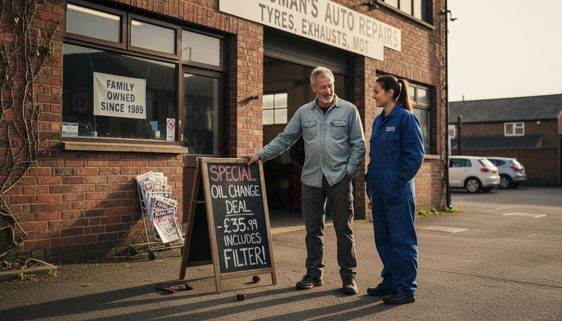 Auto repair shop owner and mechanic discussing marketing outside shop