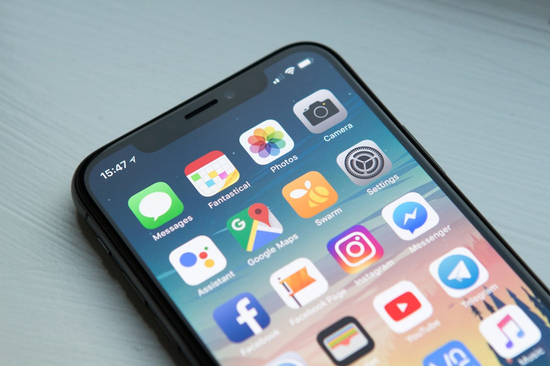 Phone repair vs replace decision — technician assessing device damage and repair cost