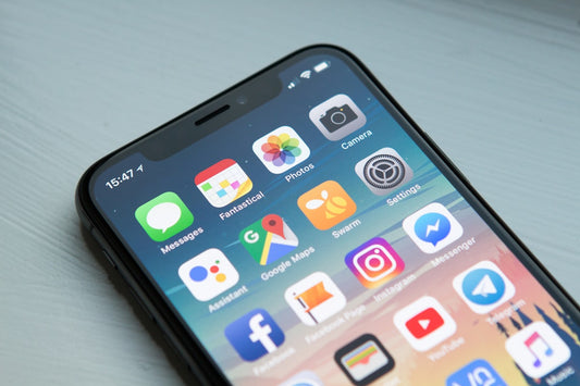 Phone repair vs replace decision — technician assessing device damage and repair cost