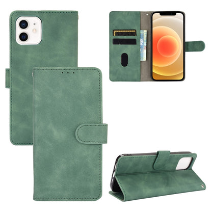 For iPhone 13 Solid Color Skin Feel Magnetic Buckle Horizontal Flip Calf Texture PU Leather Case with Holder & Card Slots & Wallet(Green) by buy2fix