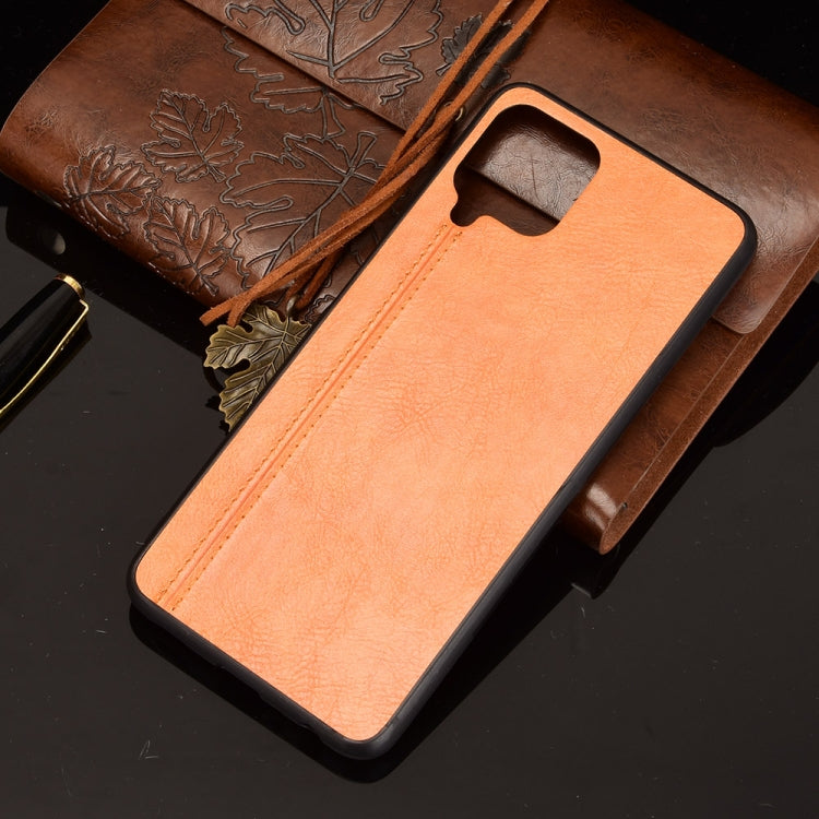 For Samsung Galaxy A22 4G Shockproof Sewing Cow Pattern Skin PC + PU + TPU Case(Orange) by buy2fix