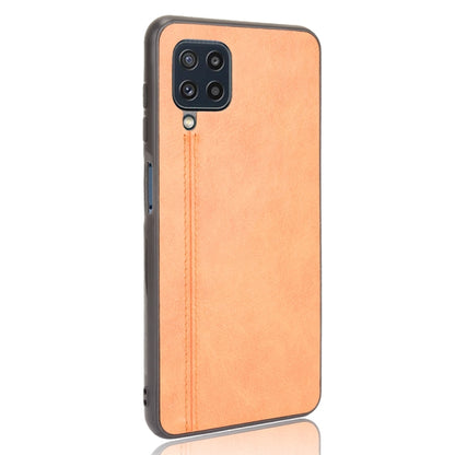 For Samsung Galaxy M32 4G Shockproof Sewing Cow Pattern Skin PC + PU + TPU Case(Orange) by buy2fix