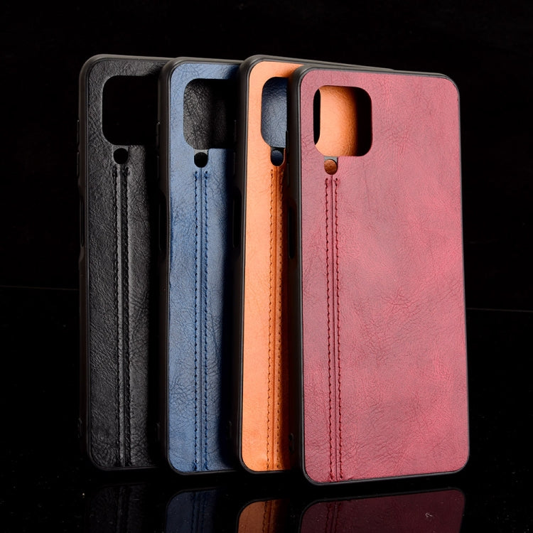 For Samsung Galaxy M32 4G Shockproof Sewing Cow Pattern Skin PC + PU + TPU Case(Orange) by buy2fix