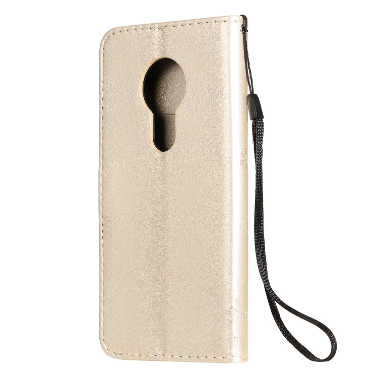 For Nokia 7.2 Tree & Cat Pattern Pressed Printing Horizontal Flip PU Leather Case with Holder & Card Slots & Wallet & Lanyard(Gold) by buy2fix