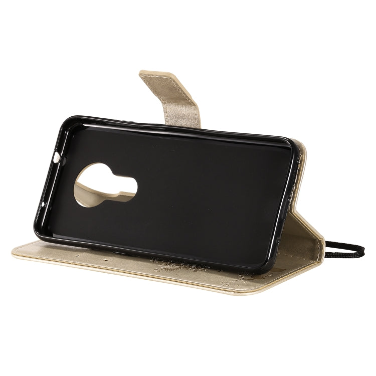 For Nokia 7.2 Tree & Cat Pattern Pressed Printing Horizontal Flip PU Leather Case with Holder & Card Slots & Wallet & Lanyard(Gold) by buy2fix