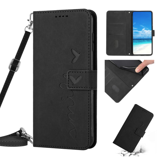 For Motorola Moto E20/E30/E40 Skin Feel Heart Pattern Leather Phone Case With Lanyard(Black)