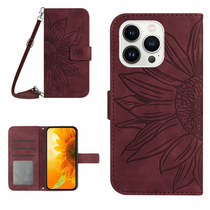 For iPhone 16 Pro Skin Feel Sun Flower Embossed Flip Leather Phone Case with Lanyard(Wine Red) by buy2fix