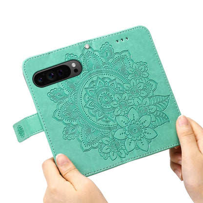 For Google Pixel 9 Pro Seven-petal Flowers Embossing Leather Phone Case(Green) by buy2fix
