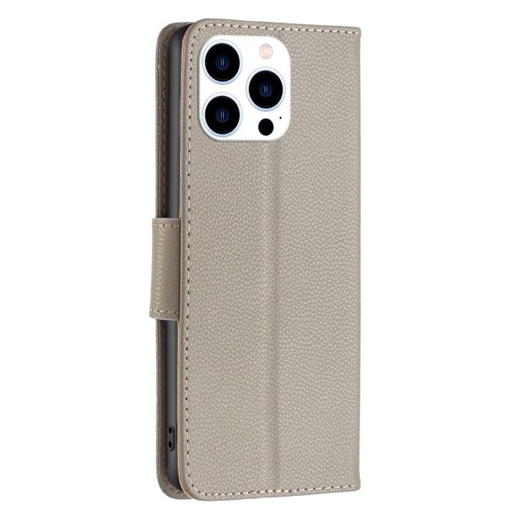 For iPhone 16 Pro Litchi Texture Pure Color Flip Leather Phone Case(Grey) by buy2fix