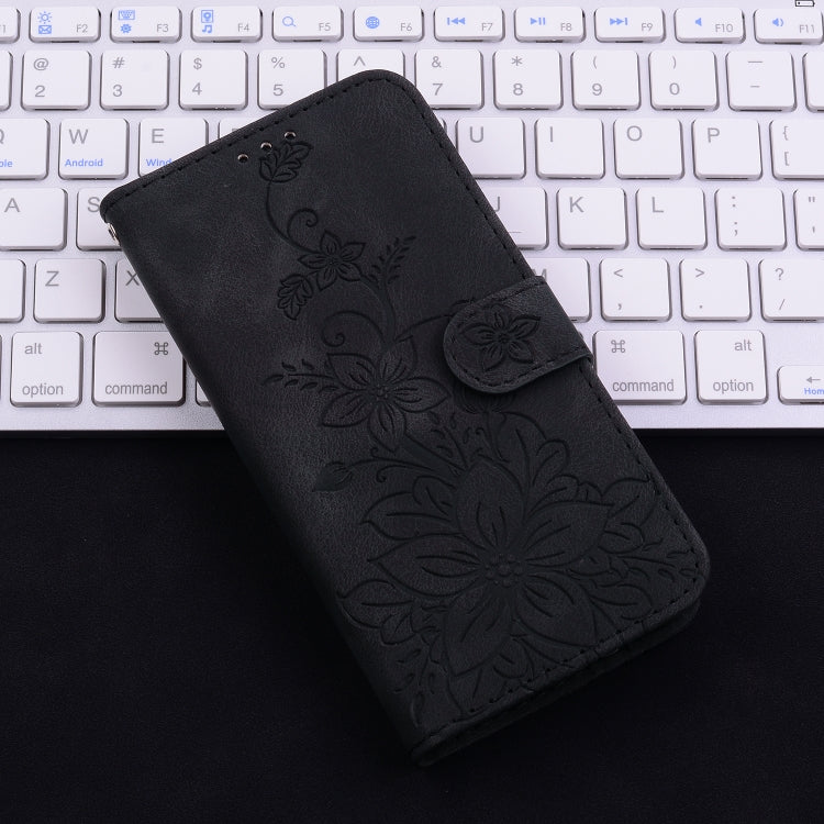 For iPhone 16e Lily Embossed Leather Phone Case(Black) by buy2fix