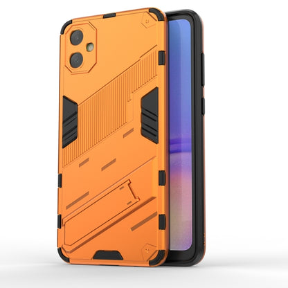 For Samsung Galaxy A05 4G Punk Armor 2 in 1 PC + TPU Shockproof Phone Case with Invisible Holder(Orange) by buy2fix