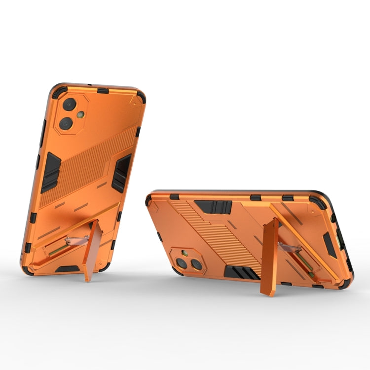 For Samsung Galaxy A05 4G Punk Armor 2 in 1 PC + TPU Shockproof Phone Case with Invisible Holder(Orange) by buy2fix