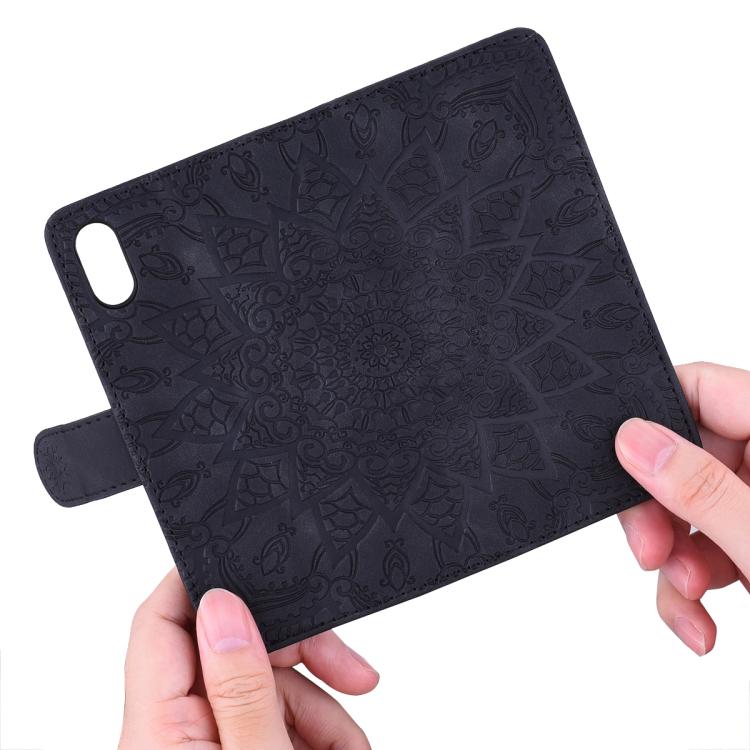 For iPhone 16e Mandala Embossed Dual-Fold Calf Leather Phone Case(Black) - iPhone 16e Cases by buy2fix | Online Shopping UK | buy2fix