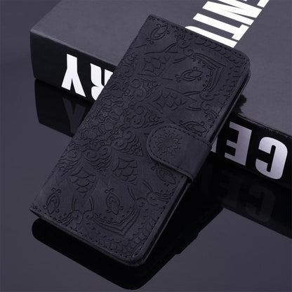 For iPhone 16e Mandala Embossed Dual-Fold Calf Leather Phone Case(Black) - iPhone 16e Cases by buy2fix | Online Shopping UK | buy2fix