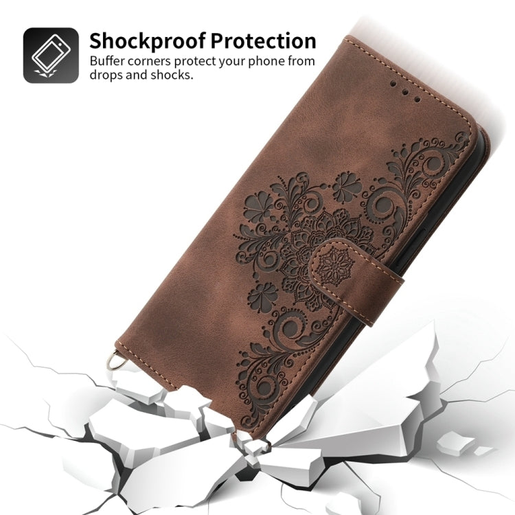 For iPhone 16e Skin-feel Flowers Embossed Wallet Leather Phone Case(Brown) by buy2fix