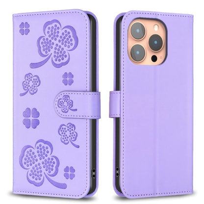 For iPhone 16 Pro Four-leaf Embossed Leather Phone Case(Purple) by buy2fix