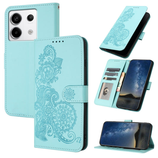 For Xiaomi Redmi Note 13 Pro 4G Datura Flower Embossed Flip Leather Phone Case(Light blue) - Xiaomi Cases by buy2fix | Online Shopping UK | buy2fix