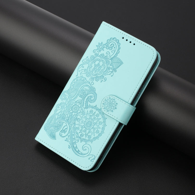 For iPhone 16e Datura Flower Embossed Flip Leather Phone Case(Light Blue) by buy2fix