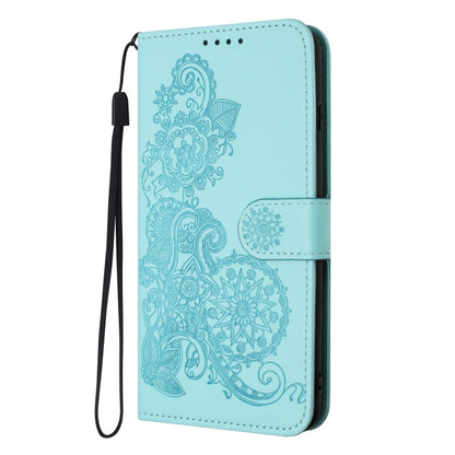 For iPhone 16e Datura Flower Embossed Flip Leather Phone Case(Light Blue) by buy2fix