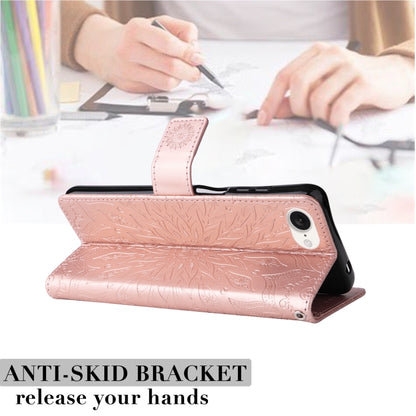 For iPhone 16e Embossed Sunflower Pattern Flip Leather Phone Case(Rose Gold) by buy2fix