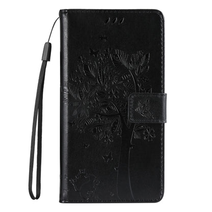 For iPhone 16e Tree & Cat Embossed Pattern Flip Leather Phone Case(Black) by buy2fix