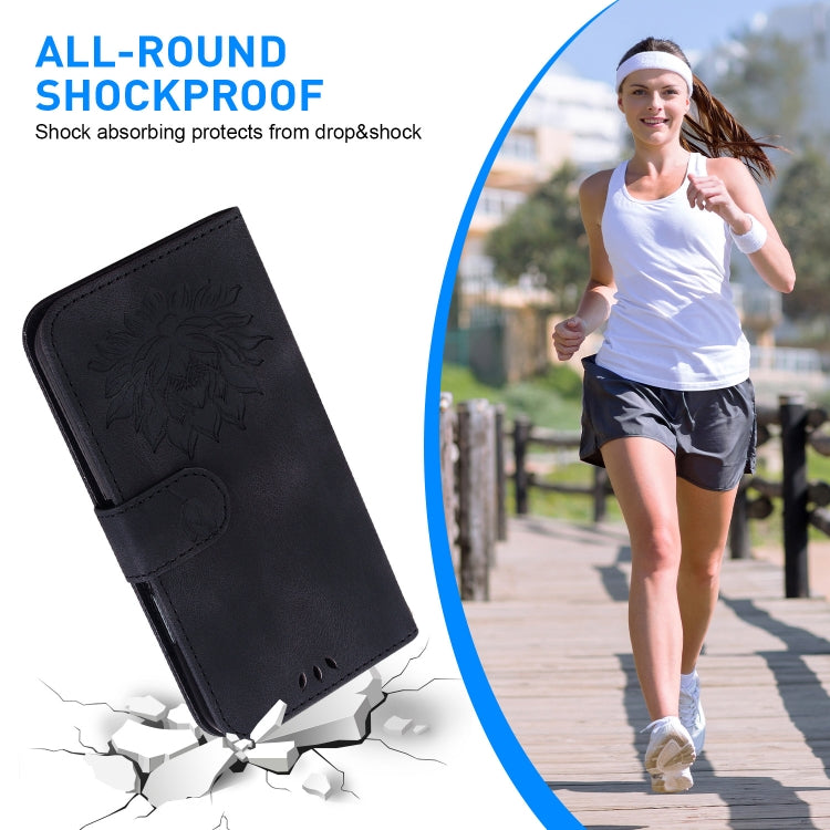 For iPhone 16e Lotus Embossed Leather Phone Case(Black) by buy2fix