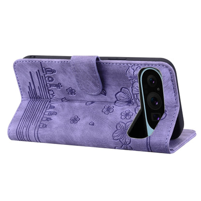 For Google Pixel 10 / 9 / 9 Pro Cartoon Sakura Cat Embossed Leather Phone Case(Purple) by buy2fix
