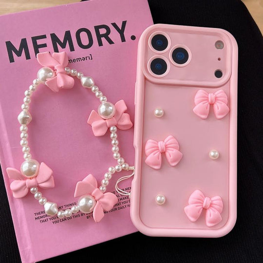 For iPhone 17 Pro Max Soft Silicone 3D Bowknot Pearl Phone Case with Beaded Wrist Strap(Pink)