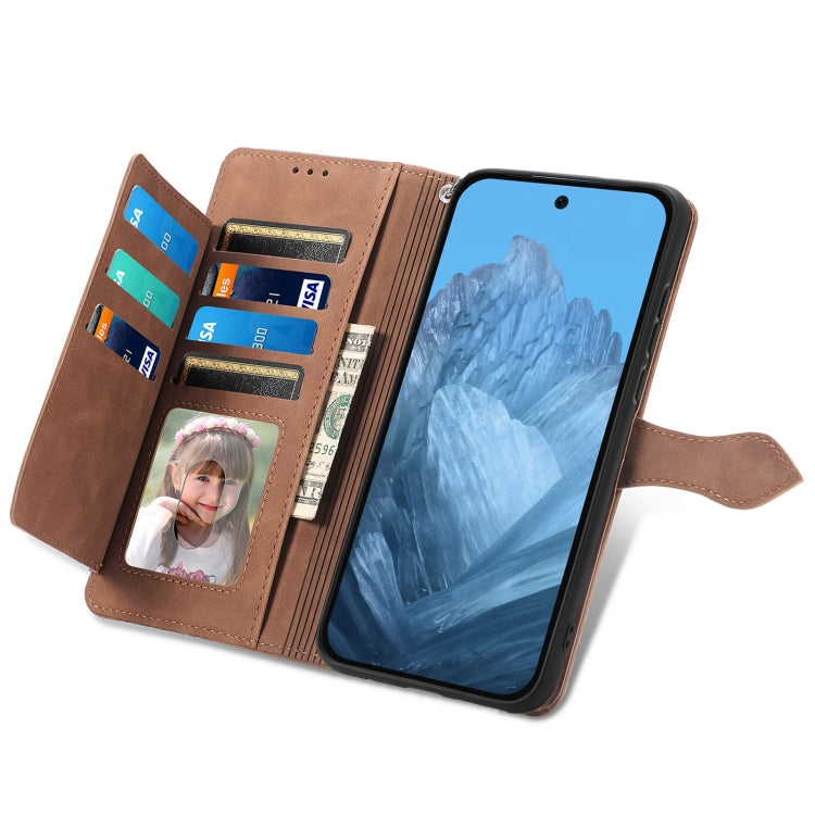 For Google Pixel 9 Embossed Flower Zipper Leather Phone Case(Brown) by buy2fix