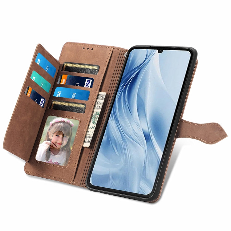 For Xiaomi Redmi 13C 5G Embossed Flower Zipper Leather Phone Case(Brown) by buy2fix