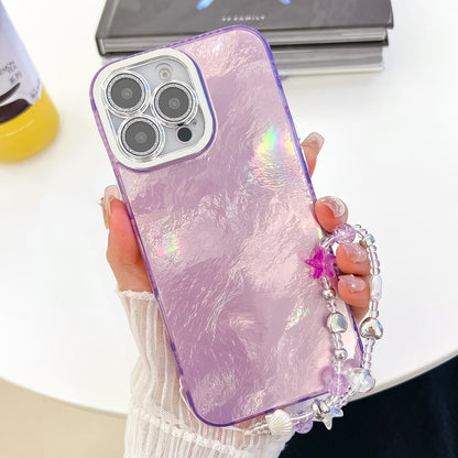 For iPhone 16 Pro Plating Glitter Texture Chain Wristband TPU Phone Case with Lens Film(Purple Tinfoil Texture) by buy2fix