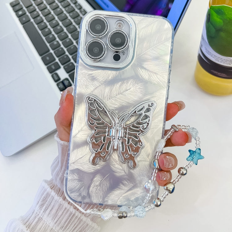 For iPhone 16 Pro Max Plating Glitter Lens Film Texture Butterfly Holder Wristband Phone Case(White Feathers) by buy2fix