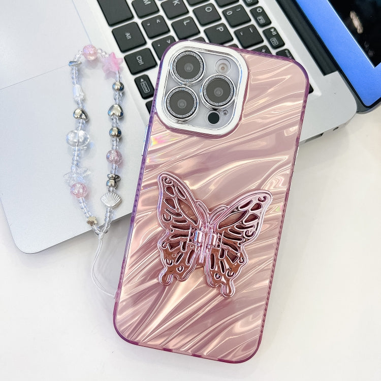 For iPhone 16 Pro Plating Glitter Lens Film Texture Butterfly Holder Wristband Phone Case(Pink Water Ripples) by buy2fix