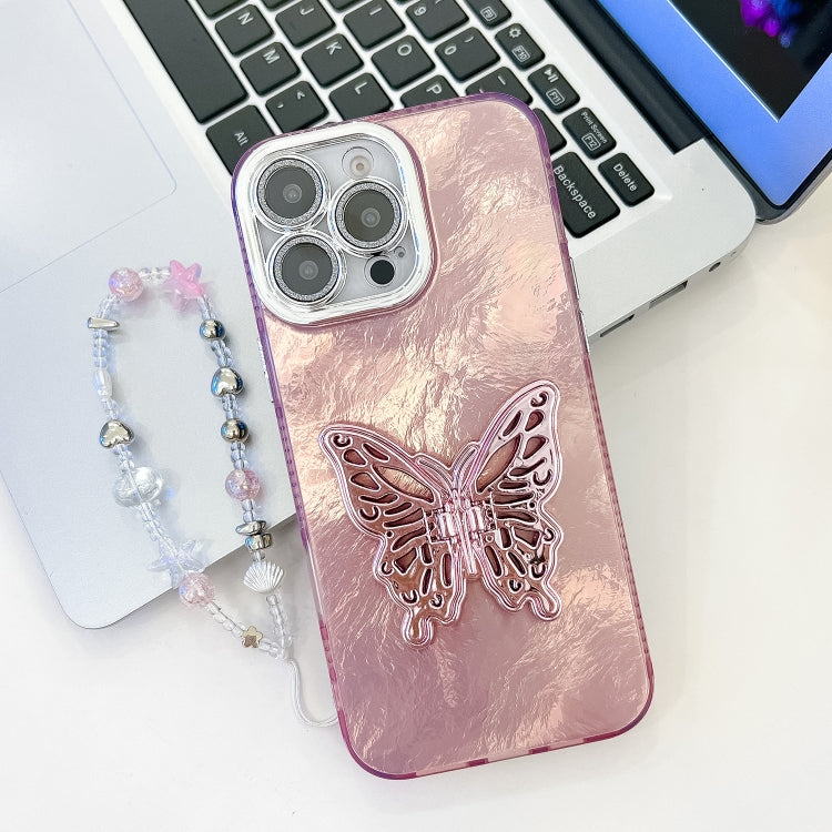 For iPhone 16 Pro Plating Glitter Lens Film Texture Butterfly Holder Wristband Phone Case(Pink Tinfoil Texture) by buy2fix