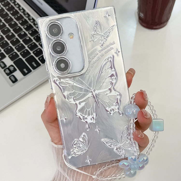 For Samsung Galaxy S25 5G Plating Texture Butterfly Wristband TPU Phone Case with Glitter Lens Film(Silver Butterflies HU6) by buy2fix