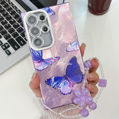 For Samsung Galaxy S25 Ultra 5G Plating Texture Butterfly Wristband TPU Phone Case with Glitter Lens Film(Purple Butterflies HU4) by buy2fix