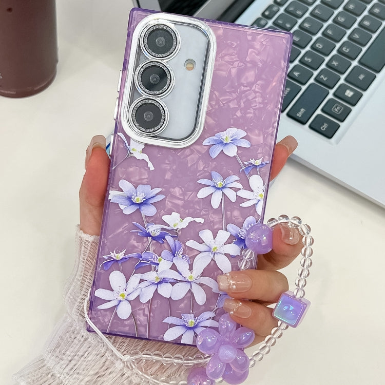 For Samsung Galaxy S25+ 5G Electroplating Flowers Plants Texture Wristband TPU Phone Case(Lilac Flowers FL16) by buy2fix