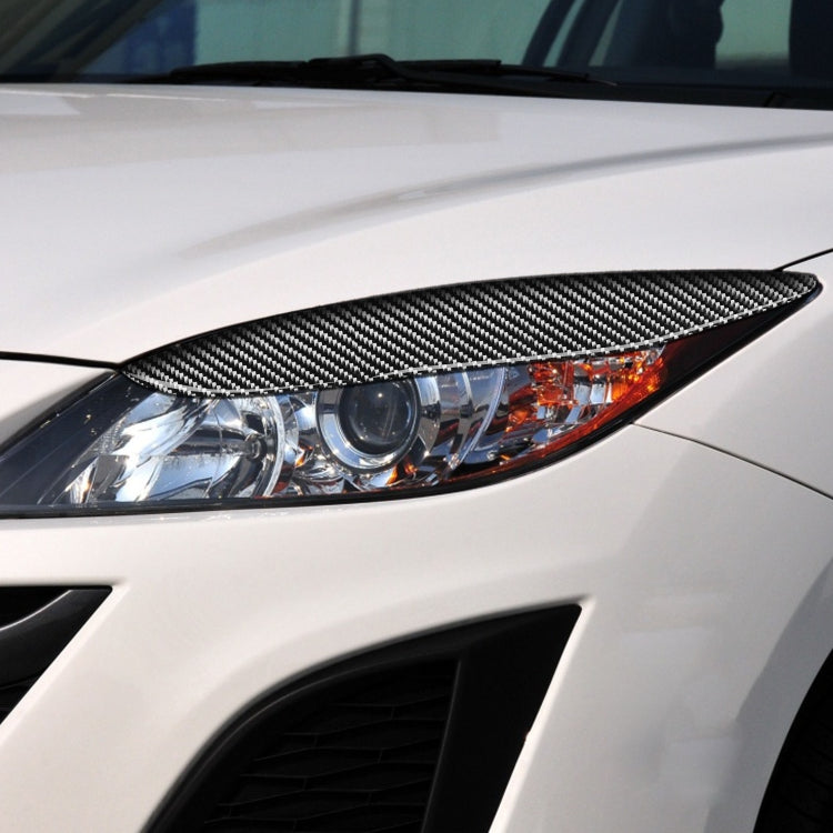 2 PCS / Set Carbon Fiber Car Lamp Eyebrow Decorative Sticker for Mazda 3 2010-2013 / M3 Xingcheng, Drop Glue Version by buy2fix