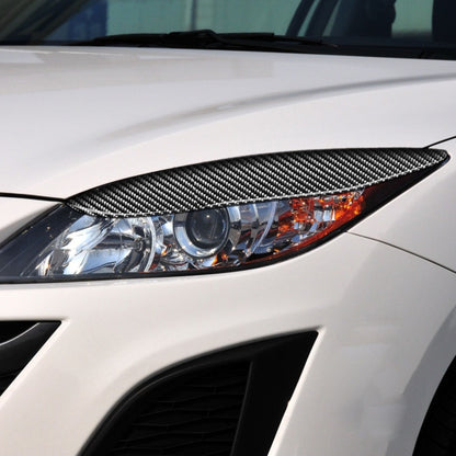 2 PCS / Set Carbon Fiber Car Lamp Eyebrow Decorative Sticker for Mazda 3 2010-2013 / M3 Xingcheng, Drop Glue Version by buy2fix