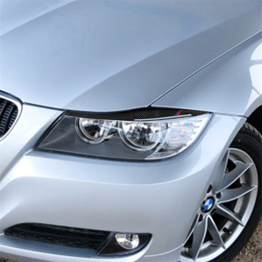 Autocollant décoratif de sourcil de lampe de voiture en Fiber de carbone, 1 paire, trois couleurs, pour BMW E90 / 318i / 320i / 325i 2009 – 2012