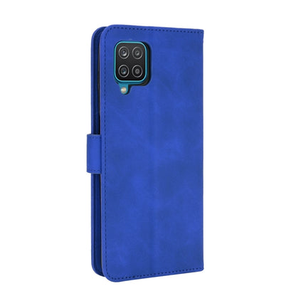 For Samsung Galaxy A12 / M12 / F12 Solid Color Skin Feel Magnetic Buckle Horizontal Flip Calf Texture PU Leather Case with Holder & Card Slots & Wallet(Blue) by buy2fix